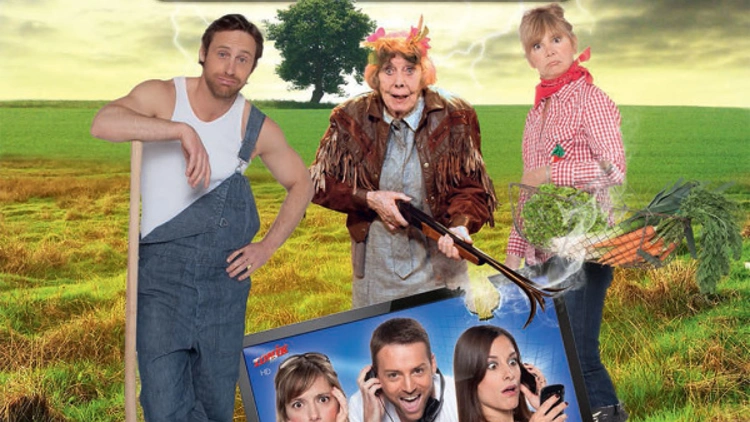 la famille est dans le pré