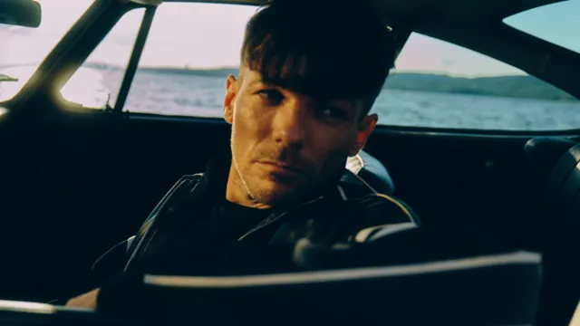 LOUIS TOMLINSON