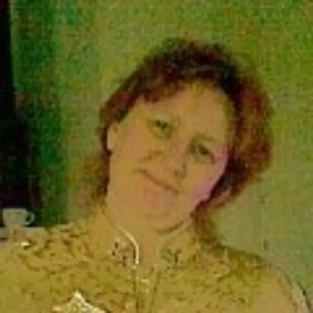 Corinne L