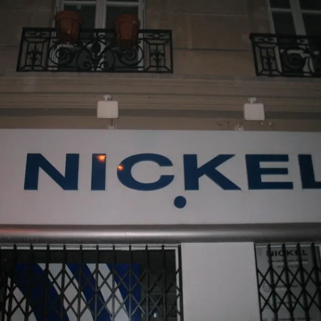 N M